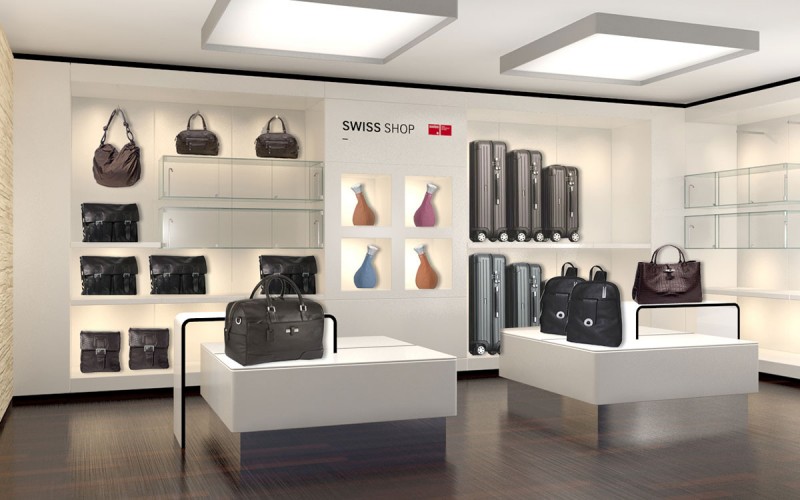 Münch+Münch Projekt Swiss Shop - Visualisierung Wand und Produktinseln mit Reisegepäck
