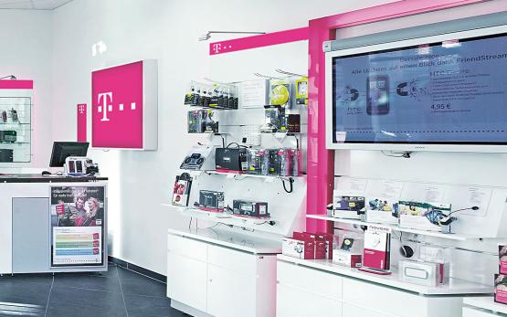 Münch+Münch Projekt Telekom - Shop Siegen Wandabwicklung mit Screen